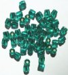 50 7mm Ornelia Cut Emerald Silverlined Beads